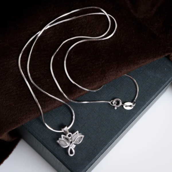 Pendant and snake chain display of Lotus Pendant and Stud Set 925 Silver