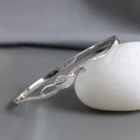Side slant view showing the centerpiece of Sparkling Leaf Bracelet 925 Silver