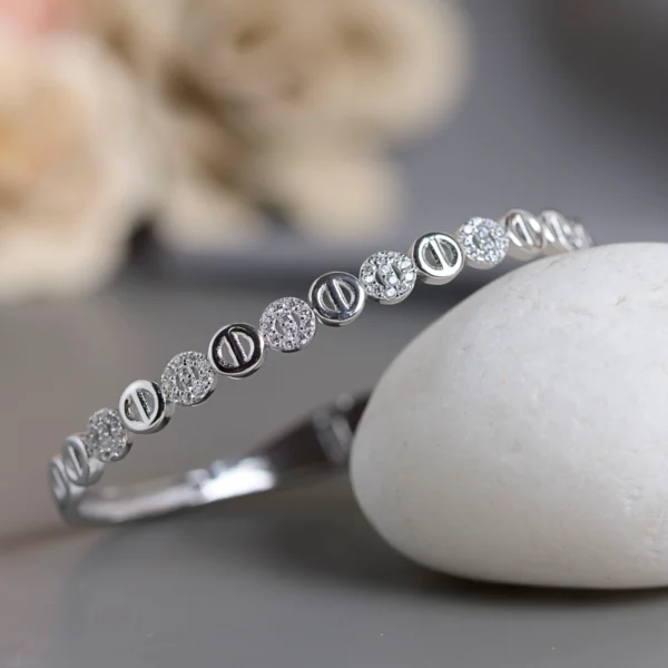 Slanting front view of Alternating Pave Circle Kada 925 Silver
