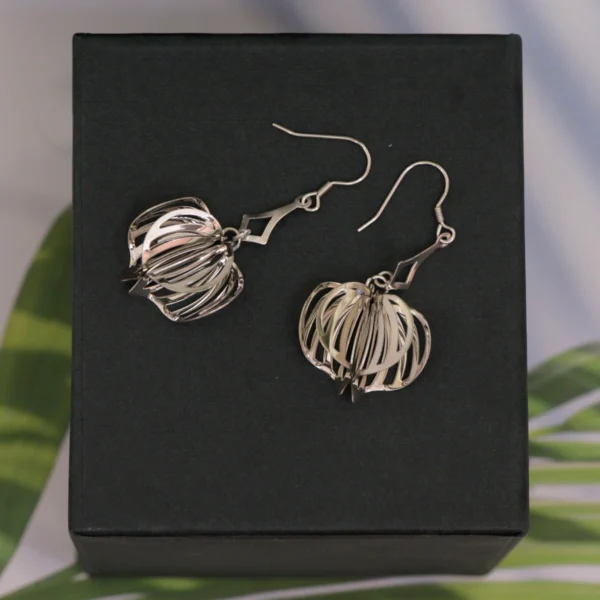 Top view with drop display of Cage Drop Earrings 925 Silver