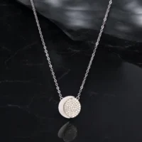 Close up of Celestial Moon Pave Disc Necklace 925 Silver