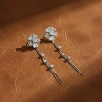 Close up of Dazzling Floral Tassel Drop Earrings 925 Silver