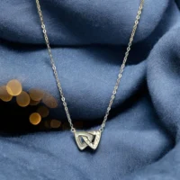 Close up of Elegant Interlocking Triangle CZ Necklace 925 Silver