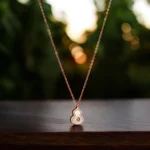 Close up of Elegant MOP CZ Good Luck Gourd Necklace Rose Gold Polish 925 Silver