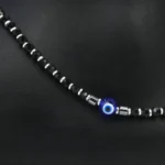 Close up of Minimalist Black Bead Evil Eye Anklets 925 Silver