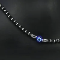 Close up of Minimalist Black Bead Evil Eye Anklets 925 Silver