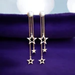 Close up of Rose Gold Pearl Star Chain Drop Earrings 925 Silver