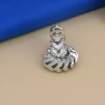 Close up of Sculptural Pave Huggie Hoop Earrings 925 Silver