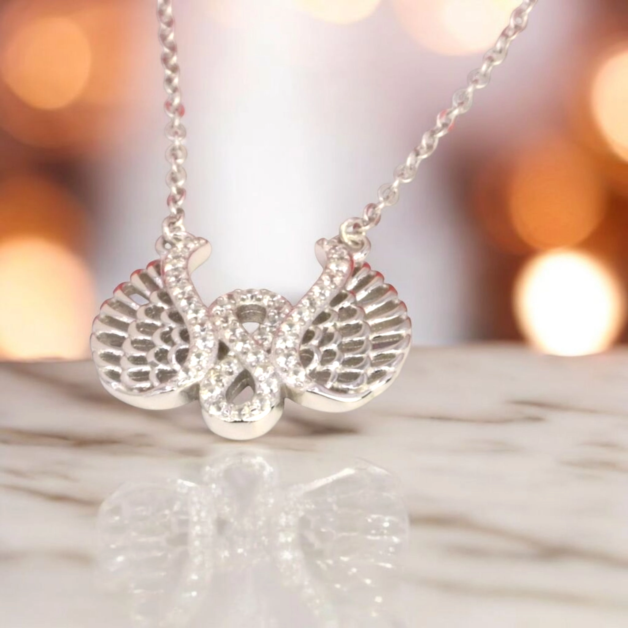 Sparkling Pave CZ Angel Wing Necklace – 925 Silver 1 Close up of Sparkling Pave CZ Angel Wing Necklace 925 Silver