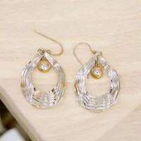 Close up of Textured Woven Teardrop Drop Earrings 925 Silver