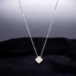 Close up of clear CZs of Reversible Pave CZ Clover Necklace 925 Silver