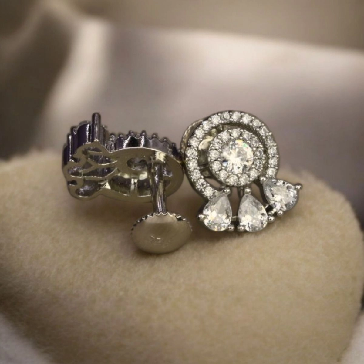 Dazzling Pear-Cut Cluster Stud Earrings – 925 Silver 2 Close up with locking mechanism display of Dazzling Pear-Cut Cluster Stud Earrings 925 Silver