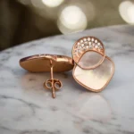 Close up with locking mechanism on display of Luminous Rose Gold Mother of Pearl Stud Earrings 925 Silver