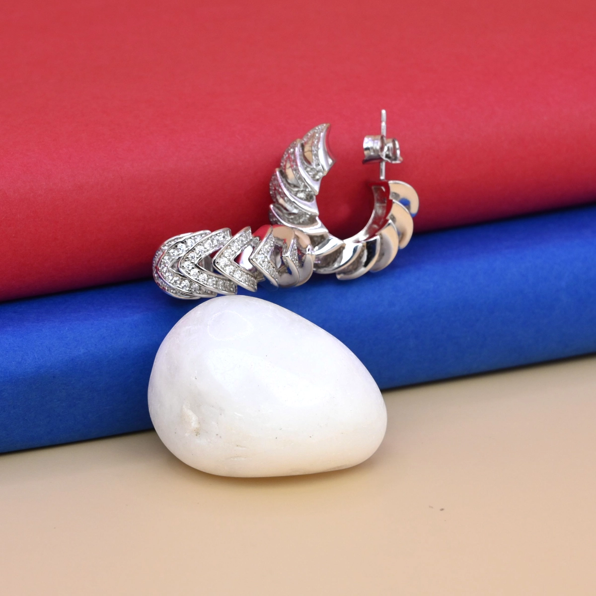 Sculptural Pave Huggie Hoop Earrings – 925 Silver 2 Front view of Sculptural Pave Huggie Hoop Earrings 925 Silver