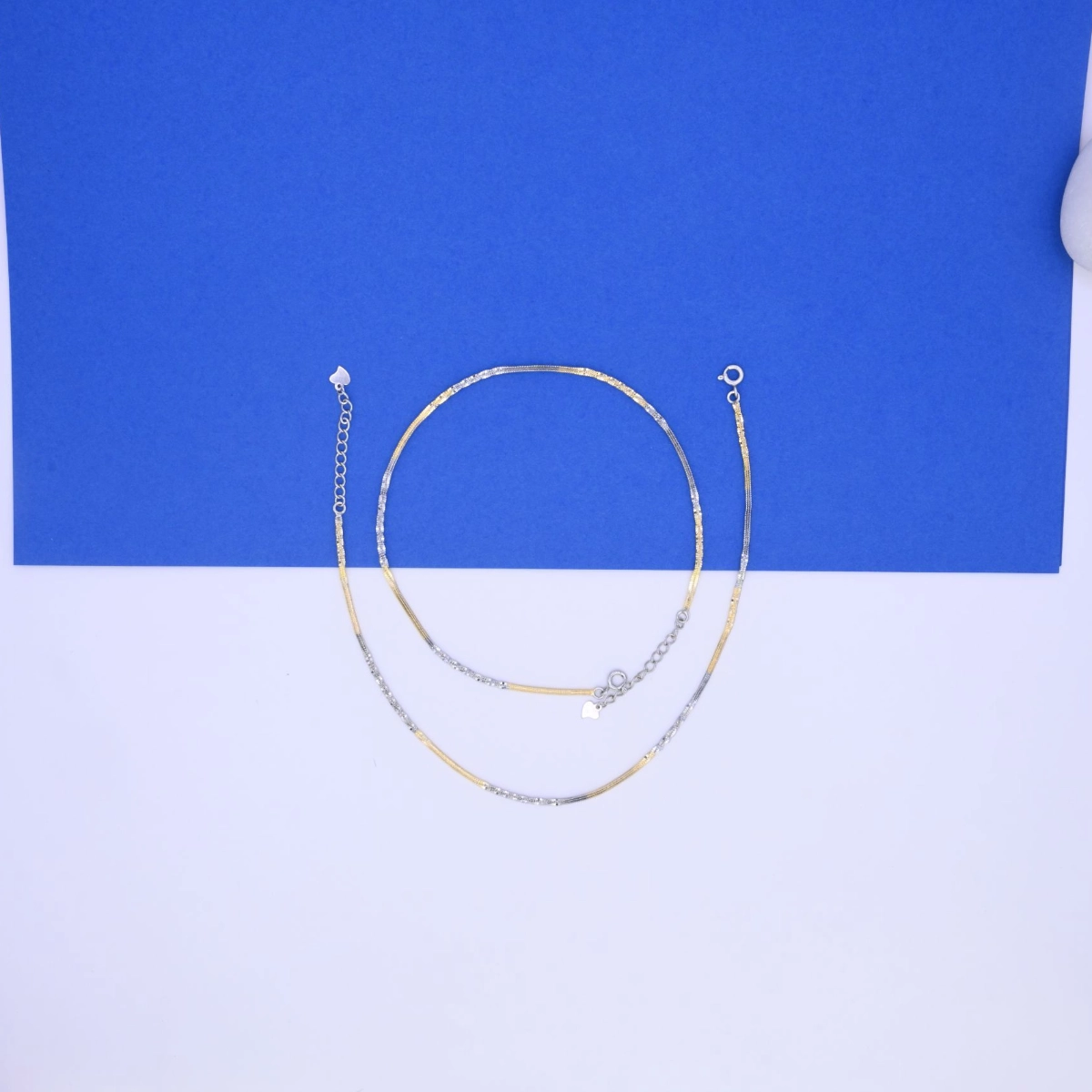 Chic Dual-Tone Sparkle-Cut Herringbone Anklets – 925 Silver 4 Full length view with locking mechanism on display of Chic Dual-Tone Sparkle-Cut Herringbone Anklets 925 Silver