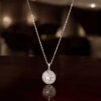 Hanging view of Luminous Pearl Pave CZ Starburst Necklace 925 Silver