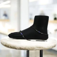 Mannequin leg display of Sleek Nazariya Anklets with Tubes 925 Silver