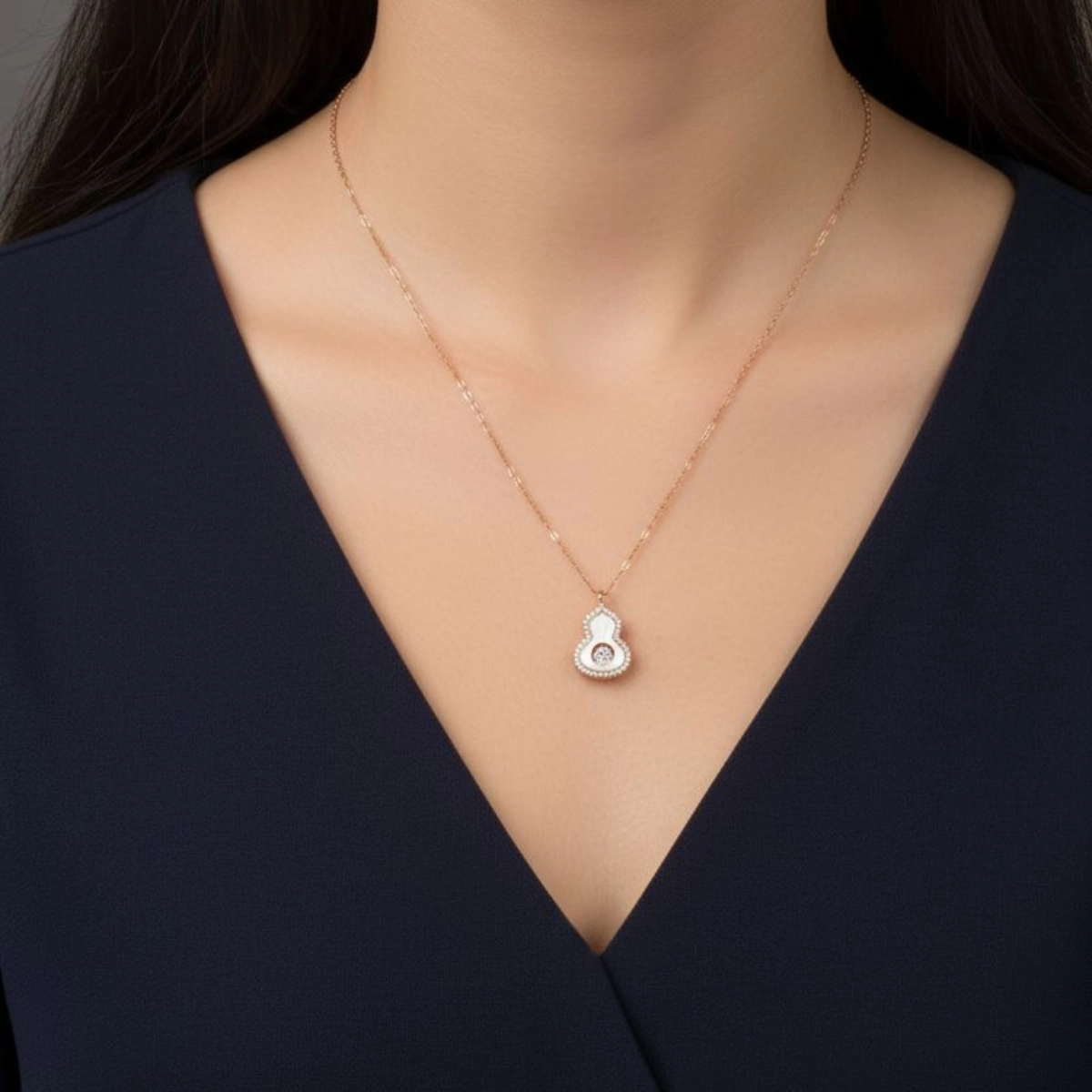 Elegant MOP CZ Good Luck Gourd Necklace – Rose Gold Polish 925 Silver 3 Model wearing Elegant MOP CZ Good Luck Gourd Necklace Rose Gold Polish 925 Silver