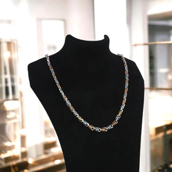 On bust display of Dual-Tone Byzantine Weave Chain Rose Gold and Silver