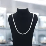 On bust display of The Signature S-Link Flat Chain 925 Silver