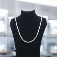 On bust display of The Signature S-Link Flat Chain 925 Silver
