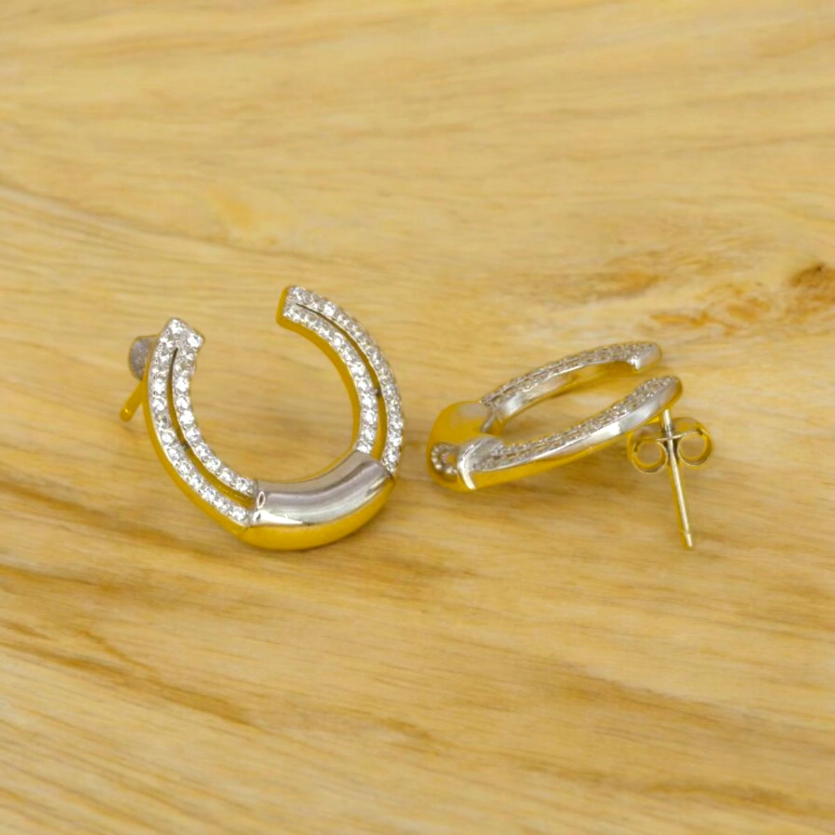 Sparkling CZ Pave Huggie Hoop Earrings – 925 Silver 3 Side view with locking mechanism on display of Sparkling CZ Pave Huggie Hoop Earrings 925 Silver