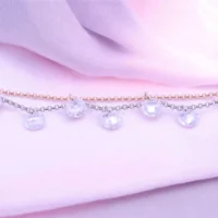 Close up of Dainty Dual-Tone Layered CZ Charm Bracelet 925 Silver