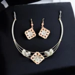 Close up of Modern Dual Tone Floral Leaf Necklace Set 925 Silver