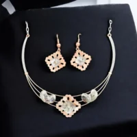 Close up of Modern Dual Tone Floral Leaf Necklace Set 925 Silver
