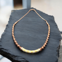 Top view of Striking Dual-Tone Greek Key Bar Necklace 925 Silver