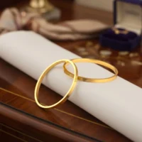 Close up of Classic Mixed Texture Gold Bangles 925 Silver