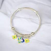 Close up of Vibrant Adjustable Silver Peacock Yellow Flower Kids Kadali 925 Silver